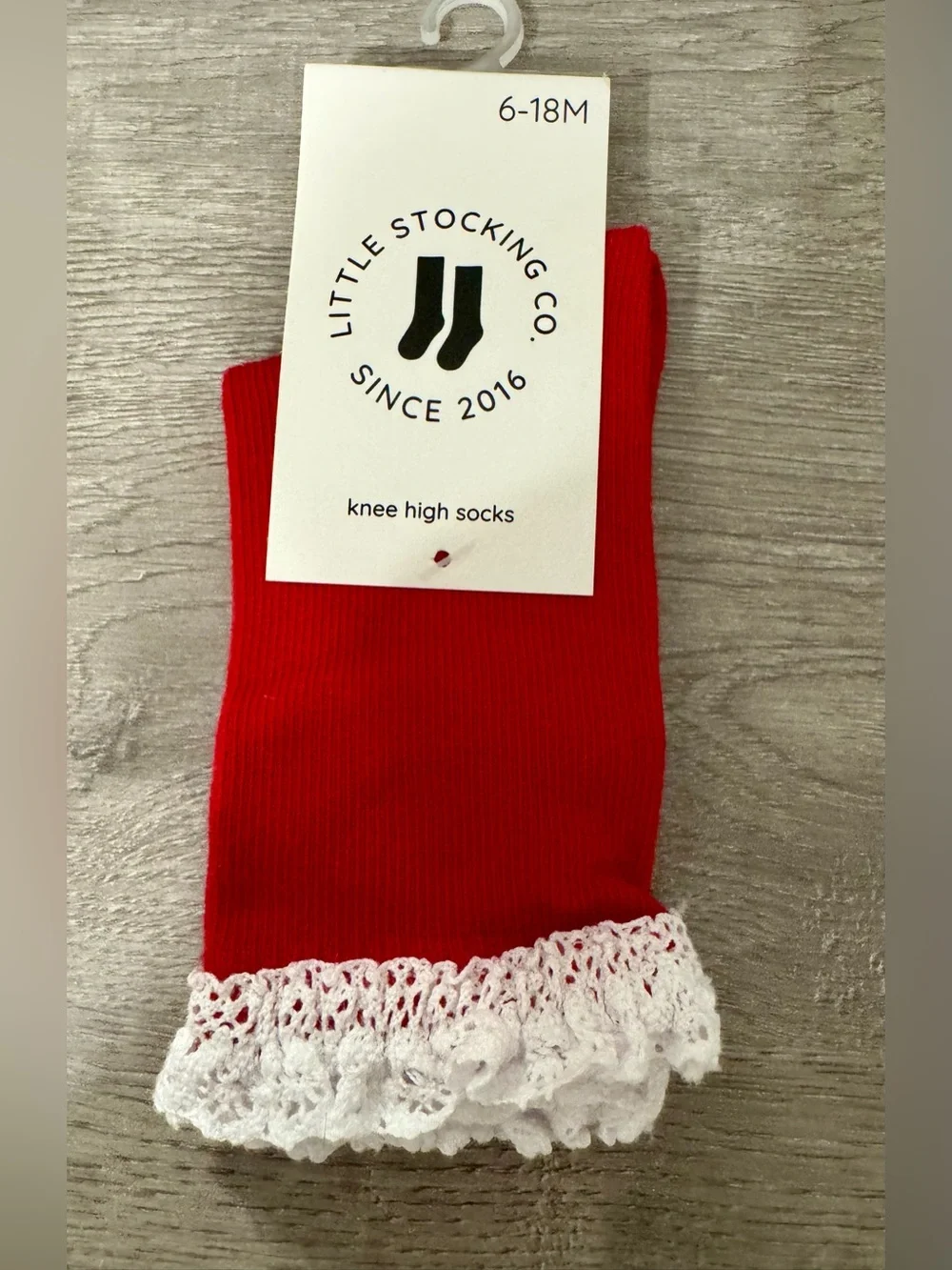 Little Stocking Co. — Red knee-high socks with lace trim at the top. Size:6-18 m